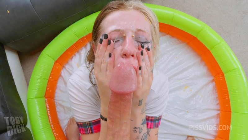 Lila Storm covers her face in cum